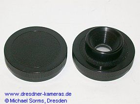 Objektivrckdeckel mit Fernrohrokular (links Standarddeckel)