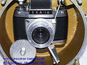 bertragung des Auslsers, des Filmaufzuges, der Fokussierung und Blendeneinstellung