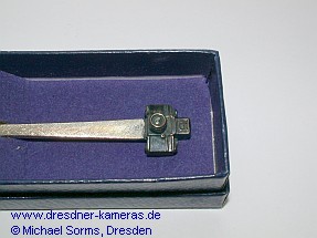 Silberlffel mit einer Exakta-Kamera