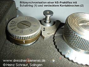 Praktiflex Version 6 mit Blitzsynchronisation durch Schaltring und verdecktem Kontaktnocken sowie zwei Blitzbuchsen vorn in der Deckkappe
